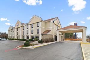 a rendering of a hotel with a parking lot at Comfort Inn Dunn near I-95 in Dunn