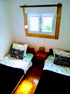 Postel nebo postele na pokoji v ubytování Apartment Ma're