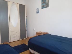 Postel nebo postele na pokoji v ubytování Apartment Ma're