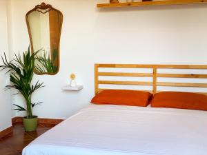 Postel nebo postele na pokoji v ubytování Coliving Together Gargano
