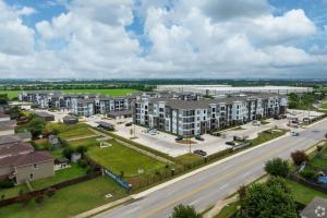 an aerial view of a city with buildings and a street at Luxury Apartments Near Airport in Austin