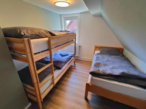 En eller flere senge i et værelse på Altenauer Kaffeehaus