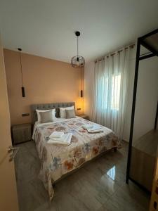 Кровать или кровати в номере Villa Tile