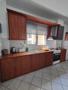 Kuchyňa alebo kuchynka v ubytovaní Roses RT apartments Skioni II