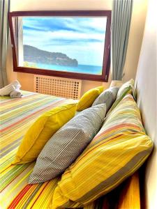 Postel nebo postele na pokoji v ubytování Relais Fontania