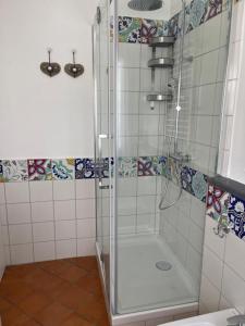Koupelna v ubytování Relais Fontania + 12 fotografií