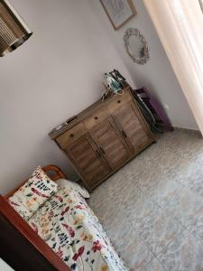 Ένα ή περισσότερα κρεβάτια σε δωμάτιο στο House ROSI in Rodos city