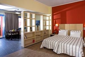 Ein Bett oder Betten in einem Zimmer der Unterkunft Sirena Residence & Spa