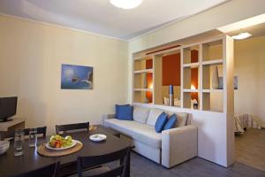 Ein Sitzbereich in der Unterkunft Sirena Residence & Spa