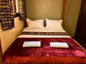 Ubuntu Hivve Hostel客房内的一张或多张床位