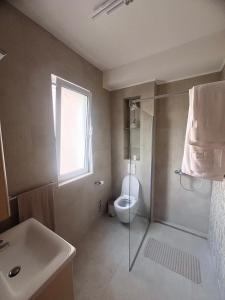 Ένα μπάνιο στο Apartmani Krivokapic +32 φωτογραφίες