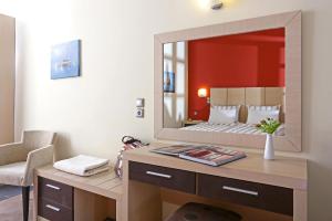 Ein Bett oder Betten in einem Zimmer der Unterkunft Sirena Residence & Spa