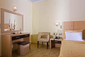 Ein Bett oder Betten in einem Zimmer der Unterkunft Sirena Residence & Spa