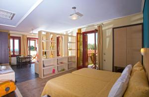 Ein Bett oder Betten in einem Zimmer der Unterkunft Sirena Residence & Spa