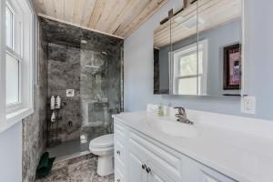 a bathroom with a sink and a shower at Beeshore Lakehouse Waterfront Bliss & Comfort in Lions Head +38 photos