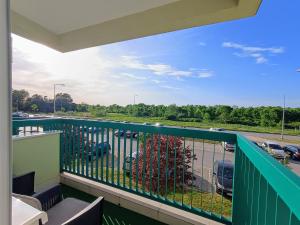 a balcony with a view of a parking lot at MV Dreams, free parking in Novi Sad