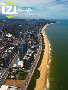 an aerial view of a beach and the ocean at Apto moderno c/ Vista Incrível para o Mar in Itaparica +22 photos