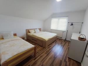 Postel nebo postele na pokoji v ubytování Urban Home