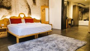 Een bed of bedden in een kamer bij Relais Villa Olivi