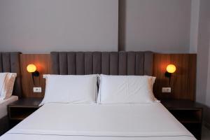 Letto o letti in una camera di Hotel Amare