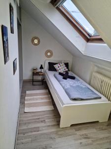 Postel nebo postele na pokoji v ubytování Cosy Apartment in City 1
