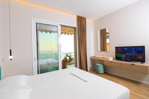 Letto o letti in una camera di Hotel Amare
