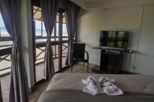 Postel nebo postele na pokoji v ubytování Costa Catalina - Beachfront Escape