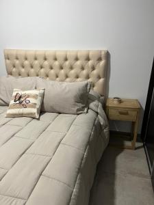 En eller flere senge i et værelse på Balcón del Centro