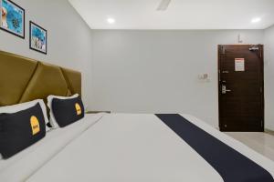 Postel nebo postele na pokoji v ubytování Hotel O D Suites