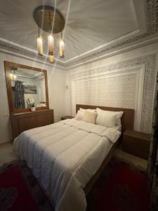 Ένα ή περισσότερα κρεβάτια σε δωμάτιο στο Cozy central apartment +7 φωτογραφίες