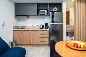 Köök või kööginurk majutusasutuses Paraíso Paulista Flats by Feel Sampa +38 fotot