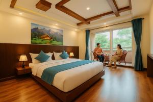 Letto o letti in una camera di Kathmandu Aagantuk Hotel