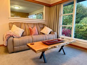 Χώρος καθιστικού στο Comfort & Warmth at Stag Lodge Near Queens Park