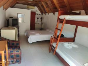 Postel nebo postele na pokoji v ubytování Hotel Xilon Melgar
