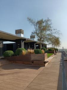 a building with a walkway in front of it at Departamento Rondizzoni cercano a Movistar Arena y a 2 minutos del metro in Santiago