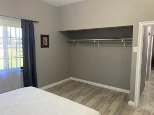 Postel nebo postele na pokoji v ubytování Sanxai Bnb- Homestay