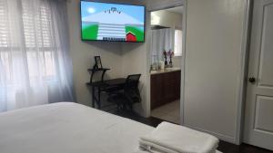 Postel nebo postele na pokoji v ubytování Damian palace