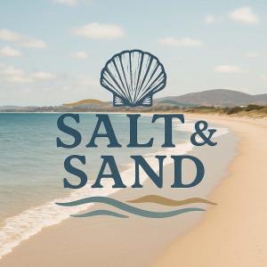 a beach with a sign that reads salt and sand at Beach Holiday Home-Close to Airport-3 Bed & 2 Bath in Lauderdale