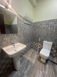 Koupelna v ubytování Metro City Hotel
