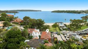 an aerial view of a town with houses and the ocean at Balmoral beauty - Elevated living on the esplanade BALO1 in Sydney