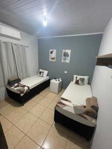 Ένα ή περισσότερα κρεβάτια σε δωμάτιο στο Hotel Stillus