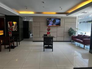 Χώρος καθιστικού στο Hotel Sogo EDSA Shaw Blvd