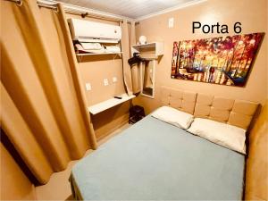 Ένα ή περισσότερα κρεβάτια σε δωμάτιο στο Casa Galaxy