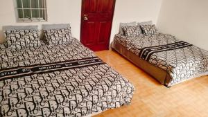 Postel nebo postele na pokoji v ubytování Nhím biển