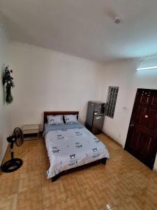 Postel nebo postele na pokoji v ubytování Nhím biển
