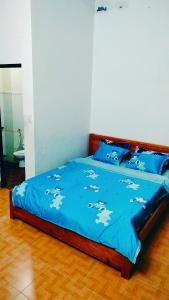 Postel nebo postele na pokoji v ubytování Nhím biển