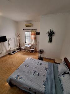 Postel nebo postele na pokoji v ubytování Nhím biển