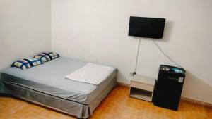 Postel nebo postele na pokoji v ubytování Nhím biển