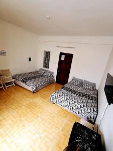 Postel nebo postele na pokoji v ubytování Nhím biển