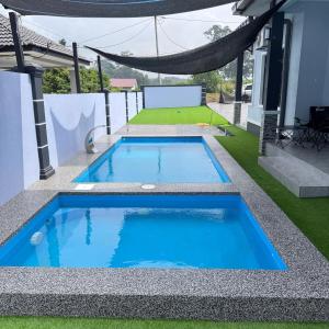 Πισίνα στο ή κοντά στο Homestay D'Ammar Private Pool